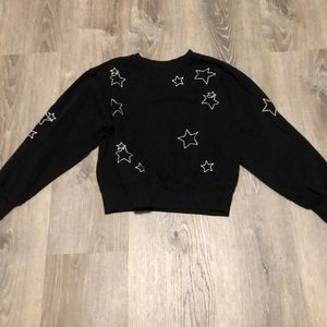 Black sweatshirt with embroidered white stars